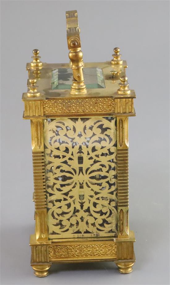 An early 20th century French ormolu hour repeating carriage clock, 6.5in., with red leather travelling case